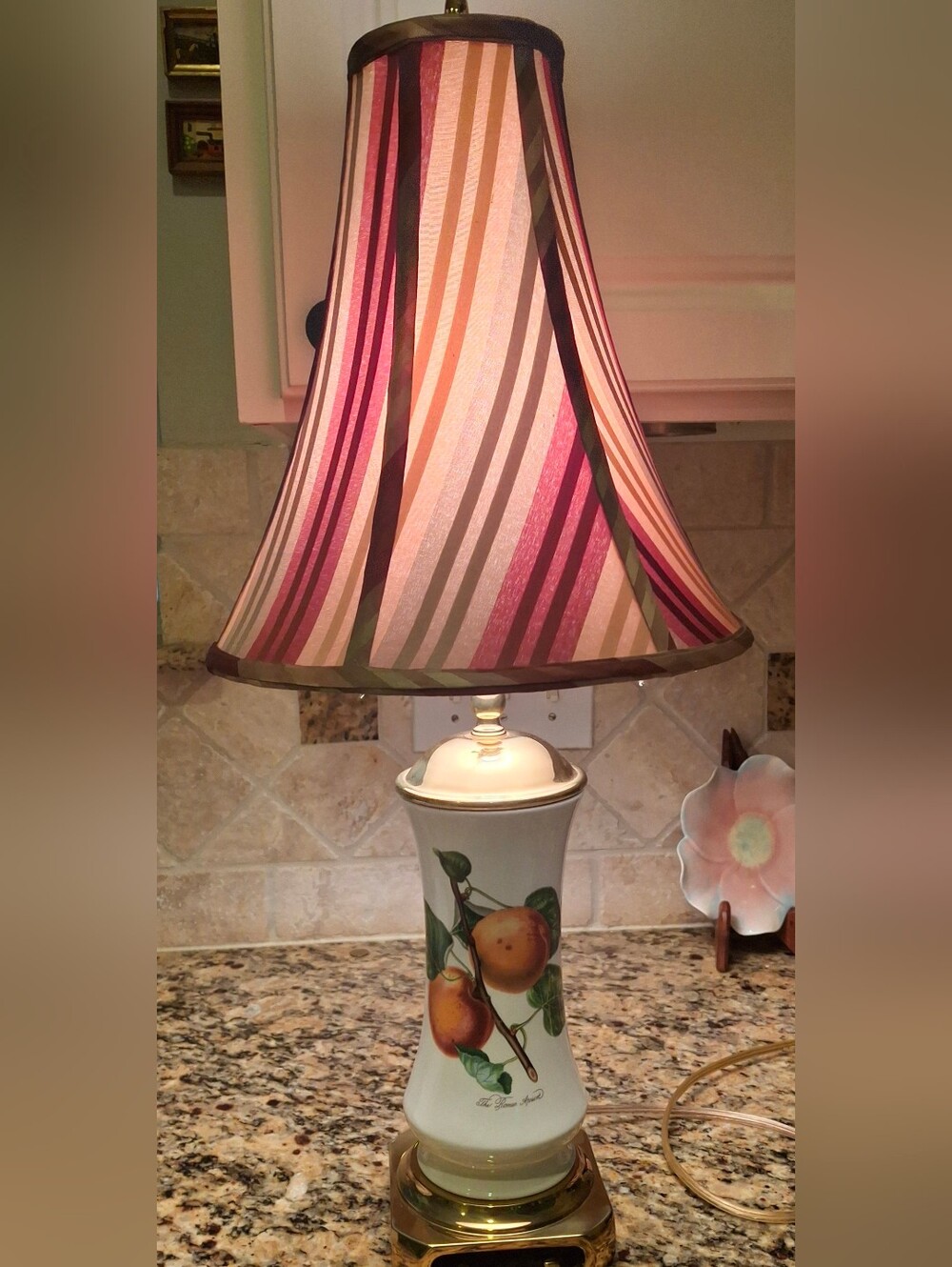 Brass-Trimmed Ceramic Table Lamp with Striped Orange Shade